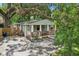 Charming single-story home with a welcoming front porch and lovely landscaping at 1104 E Anderson St, Orlando, FL 32801