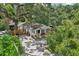 Charming home with a welcoming front porch and lush landscaping at 1104 E Anderson St, Orlando, FL 32801