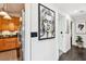 Hallway with modern art, lighting, and stainless steel appliances at 1104 E Anderson St, Orlando, FL 32801