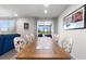 Elegant dining room with a large wooden table and stylish chairs, perfect for entertaining at 1158 Oak Valley Dr, Auburndale, FL 33823
