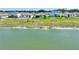 Scenic view of a lakefront property showcasing the natural beauty and waterfront living at 1158 Oak Valley Dr, Auburndale, FL 33823