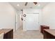 Room with neutral carpet, ceiling fan, sliding closet doors, and a small wooden dresser at 1158 Oak Valley Dr, Auburndale, FL 33823