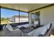 Cozy screened patio with comfortable seating, perfect for enjoying outdoor relaxation and entertaining at 1158 Oak Valley Dr, Auburndale, FL 33823