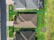 Aerial view of the property showing the roof, landscaping, and surrounding neighborhood at 1416 Lexington Ave, Davenport, FL 33837