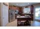 Well-equipped kitchen features stainless steel appliances and ample counter space at 1416 Lexington Ave, Davenport, FL 33837