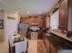 Modern kitchen with stainless steel appliances, granite countertops, and dark wood cabinets at 1416 Lexington Ave, Davenport, FL 33837
