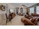 Comfortable living room with tile floors, and ample seating, perfect for relaxation at 1416 Lexington Ave, Davenport, FL 33837