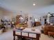 Open concept living space with dining area and view of the living room and kitchen at 1416 Lexington Ave, Davenport, FL 33837