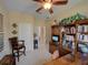 Office area with wood furnishings, a desk, and decorative accents that create an inviting workspace at 1416 Lexington Ave, Davenport, FL 33837