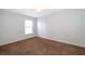 Bedroom featuring a ceiling fan and a large window at 153 Pine Isle Dr, Sanford, FL 32773