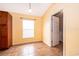 Sunny room featuring tile floors, large windows, and built-in storage at 153 Pine Isle Dr, Sanford, FL 32773
