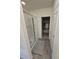Bright bathroom features a glass-enclosed shower and a door leading to a walk-in closet at 16043 Scarpetta St, Winter Garden, FL 34787
