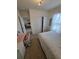 Bedroom featuring a neutral color scheme, closet, and an adjacent room view at 16043 Scarpetta St, Winter Garden, FL 34787