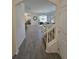 Open-concept foyer with tile flooring and stairs leading to the upper level at 16043 Scarpetta St, Winter Garden, FL 34787