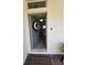 A welcoming front entryway with a decorative wreath on the door at 16043 Scarpetta St, Winter Garden, FL 34787