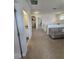 Hallway offering access to various rooms, including a bathroom and living area at 16043 Scarpetta St, Winter Garden, FL 34787