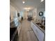 Kitchen with stainless steel appliances, an island, and granite countertops at 16043 Scarpetta St, Winter Garden, FL 34787