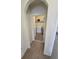 Functional laundry room equipped with a washer, dryer, and shelving for storage at 16043 Scarpetta St, Winter Garden, FL 34787