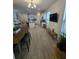 Open-concept living space with a kitchen, living area, and dining area at 16043 Scarpetta St, Winter Garden, FL 34787