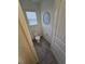 A conveniently located powder room with a toilet and decorative wall art at 16043 Scarpetta St, Winter Garden, FL 34787