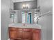 Vanity with mirrors and cabinetry at 2005 Pitch Way, Kissimmee, FL 34746