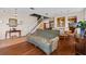 Open-concept living room and dining area with hardwood floors and abundant natural light at 2005 Pitch Way, Kissimmee, FL 34746