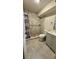 Bathroom featuring walk-in shower, tiled floor and vanity with storage and a mirror at 2350 Valley Dr, Apopka, FL 32703