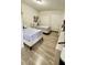 Bedroom with two beds, twin closets, and modern decor at 2350 Valley Dr, Apopka, FL 32703