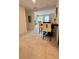 View of dining area with table set, tile flooring and doorway to living room at 2350 Valley Dr, Apopka, FL 32703