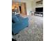 Cozy living room seamlessly connecting to a kitchen area, creating an open and airy atmosphere at 2350 Valley Dr, Apopka, FL 32703