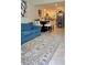 Inviting living room seamlessly connected to a well-lit kitchen, creating an open and airy atmosphere at 2350 Valley Dr, Apopka, FL 32703