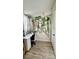 Bright study area with desk, decorative vines, and neutral tones at 2350 Valley Dr, Apopka, FL 32703