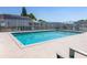 Community pool area with a fenced in area for safety and privacy at 239 King George Dr, Davenport, FL 33837
