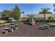 Community playground with mushroom steps and a climbing structure; perfect for active recreation at 239 King George Dr, Davenport, FL 33837