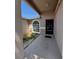 Inviting entryway with a decorative window and a well-maintained garden area at 2451 Quail Run N Blvd, Kissimmee, FL 34744
