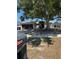 Charming single-story home with a well-manicured lawn and a mature shade tree at 2451 Quail Run N Blvd, Kissimmee, FL 34744
