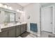 Stylish bathroom showcases double sinks, sleek countertops, and a well-lit vanity area at 249 Bella Cortina Dr, Kissimmee, FL 34759