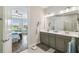 Stylish bathroom showcases double sinks, sleek countertops, and a well-lit vanity area at 249 Bella Cortina Dr, Kissimmee, FL 34759