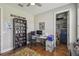 Inviting bedroom with wood floors, closet and desk area perfect for work or study at 249 Bella Cortina Dr, Kissimmee, FL 34759