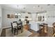 Bright kitchen with white cabinets and stainless steel appliances at 249 Bella Cortina Dr, Kissimmee, FL 34759