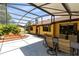 This patio features a hot tub, barbecue, and outdoor seating area at 2560 Greenwood Dr, Kissimmee, FL 34744