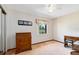 Bedroom featuring a side desk and window at 2560 Greenwood Dr, Kissimmee, FL 34744