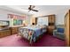 Comfortable bedroom with large window and built-in storage space for organization at 2560 Greenwood Dr, Kissimmee, FL 34744
