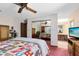The bedroom has large mirrored closet doors that extend into the bedroom providing more space at 2560 Greenwood Dr, Kissimmee, FL 34744