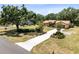 Beautiful single-story home with a well-manicured lawn and landscaping at 2560 Greenwood Dr, Kissimmee, FL 34744