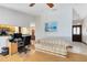 Open-concept living room with a dining area and access to the kitchen at 2560 Greenwood Dr, Kissimmee, FL 34744