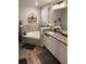 Elegant bathroom featuring a soaking tub, granite countertop, and modern fixtures at 2943 Annalee Rd, St Cloud, FL 34771