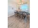 Cozy dining area with rustic table and seating, filled with natural light at 2943 Annalee Rd, St Cloud, FL 34771