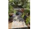 Scenic outdoor fire pit area with patio seating, creating a peaceful outdoor retreat at 2943 Annalee Rd, St Cloud, FL 34771