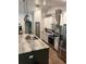 Bright kitchen featuring stainless steel appliances and gray granite countertops at 2943 Annalee Rd, St Cloud, FL 34771